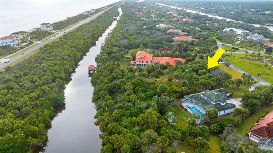 Experience ultra-luxury waterfront living on this exceptional 1.3-acre homesite in the exclusive, gated Island Estates community of Hammock Dunes. This rare estate-sized lot offers approximately 138 feet of direct saltwater canal frontage, providing quick, bridge-free access to the Intracoastal Waterway—perfect for serious boating enthusiasts and coastal lifestyle seekers. Design and build your custom dream home with room for expansive outdoor living, pool, and entertaining spaces, all overlooking tranquil water views. A private dock is easily accommodated, allowing you to keep your boat in your backyard and enjoy effortless days on the water. Island Estates is a prestigious, 24-hour guarded, private island community with deeded beach access across the street, combining the best of Intracoastal and oceanfront living. Optional membership to the renowned Hammock Dunes Club unlocks world-class amenities, including two championship golf courses, an oceanfront clubhouse with multiple dining venues, fitness center, oceanside pool, tennis, pickleball, bocce, and a full calendar of social events. With no mandatory build time, you can secure this premier property now and build at your own pace. Opportunities of this caliber in Island Estates are limited—this is your chance to create a signature waterfront estate in one of Florida’s most coveted coastal communities. Square footage received from tax rolls. All information recorded in the MLS intended to be accurate but cannot be guaranteed.