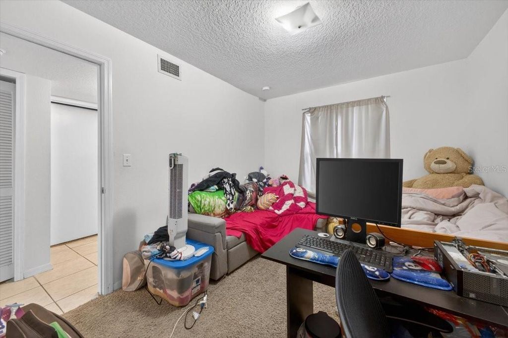 Photo of 8712 Rain Forest Place #B, Kissimmee, FL 34747 (MLS # O6397935)