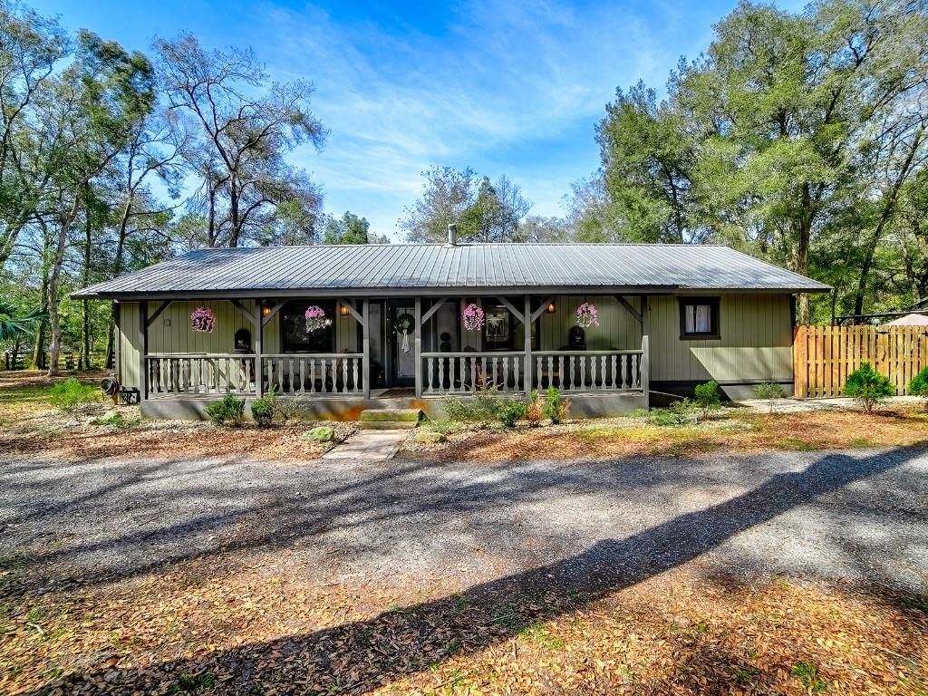 Photo of 213 W Virginia Avenue, Deland, FL 32720 (MLS # TB8495298)