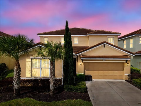 Photo of 7560 Oakmoss Loop, Davenport, FL 33837 (MLS # O6387863)