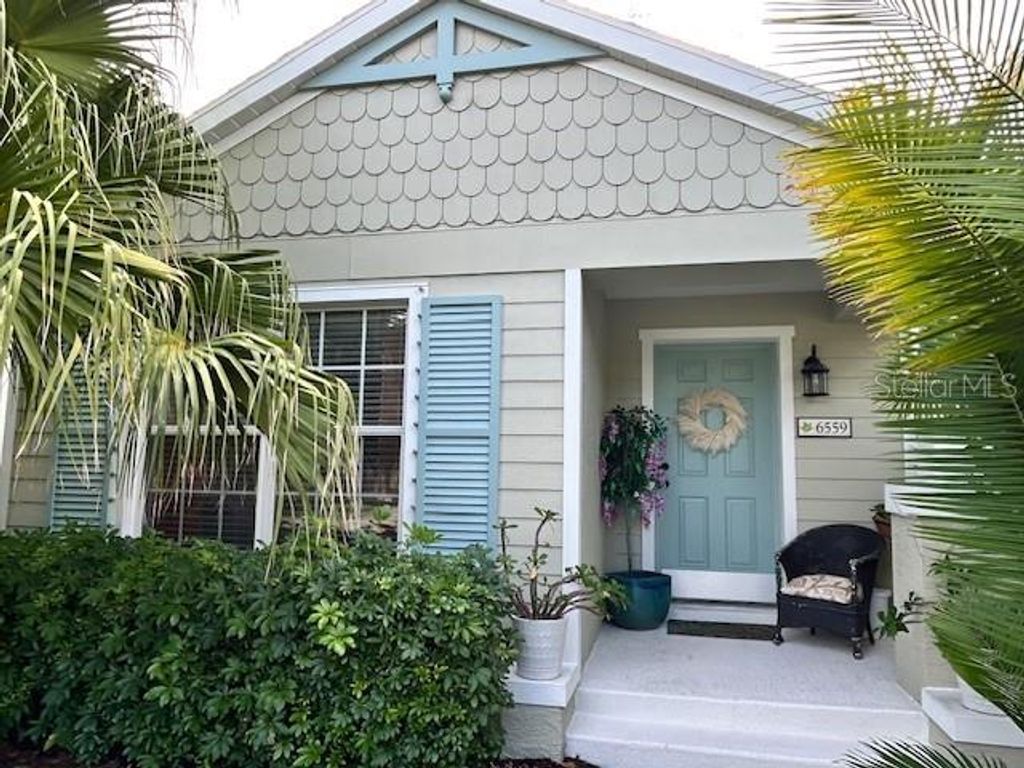 Photo of 6559 Pine Breeze Run, Sarasota, FL 34243 (MLS # A4674160)