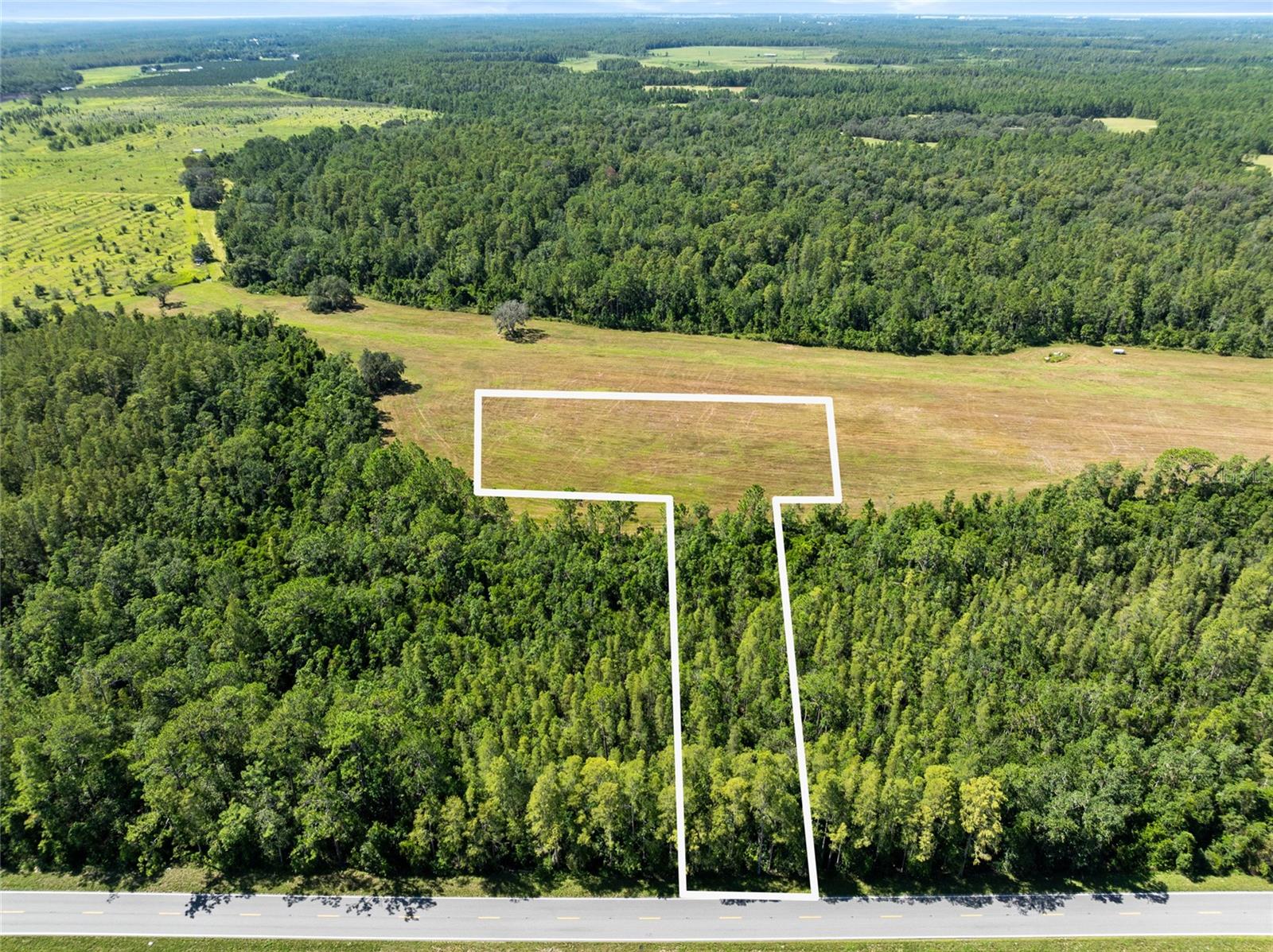 Vacant Land. 2.11 acres with approx. 100 ft frontage on Deen Still Rd. Note: buyers are encouraged to conduct thorough due diligence to ensure the property meets their expectations and requirements.