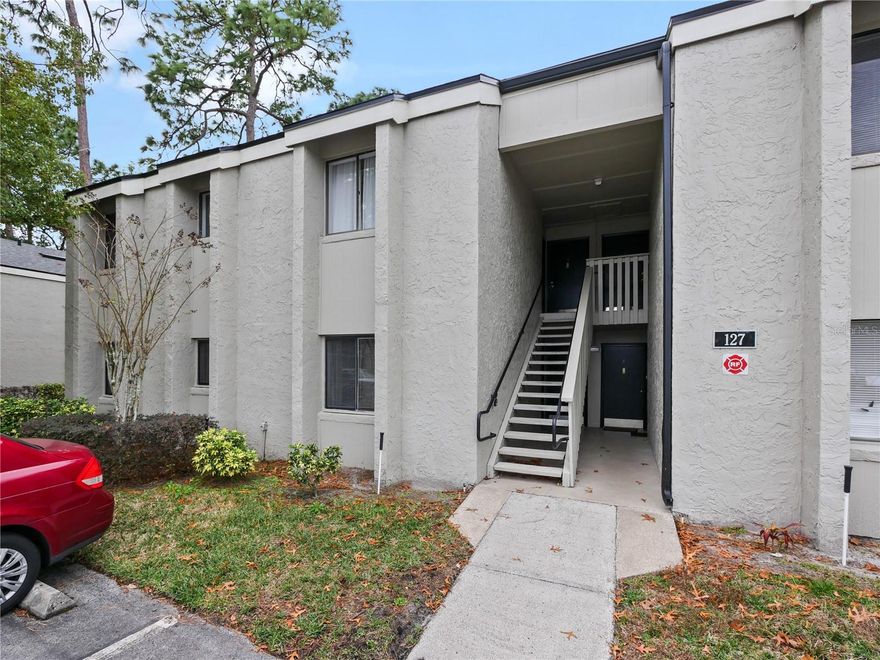 One or more photo(s) has been virtually staged. Discover the perfect downstairs one bedroom, one bath condo conveniently located in Longwood, Florida. Just a short stroll from your favorite dining spots like Starbucks, Bonefish Grill, 4 Rivers, Pickles Authentic, Chianti's Pizza and near Longwood Farmers Market and quick access to Altamonte Mall, Uptown Altamonte, hospital, beaches, attractions and I-4. This charming condo with new AC 5/25, offers a spacious living room, dining area, kitchen with refrigerator, dishwasher, range, a back splash & pantry. The large master bedroom has a large walk-in closet. The building sits on the east side of the complex, has a newer roof and there’s lots of parking for guest. Association dues pay for water, sewer, garbage, security, along with exterior maintenance of the building and grounds all for only $370 per month. The condominium has night-time security on premises, you can have peace of mind while enjoying the amenities, including two sparkling pools, tennis and basketball courts, a fitness room, a clubhouse, on-site laundry, and a car wash station with vacuum. Springwood Village offers sturdy all block and stucco construction. Property may be under video/audio surveillance.