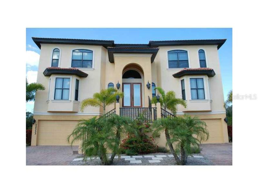 Short Sale. Price Reduction! List Price Is Pre-Approved by Lender!  Gorgeous custom-built 4 bedroom, 4.5 bath pool home in magnificent Harbour Landings subdivision. Home boasts top-of-the-line materials and appliances, including mahogany floors, porcelaintile, Brazilian Granite and GE Monogram kitchen appliances. This amazing home has a caged pool deck and multiple balconies which overlook Palma Sola Bay and the ICW. Additionally, this home has 4 master suites, a 4-car garage, an elevator and a deeded 40` boat slip with dock and 12,000 lb. lift. Supreme privacy on a preserve lot, as well! Don`t miss this opportunity!