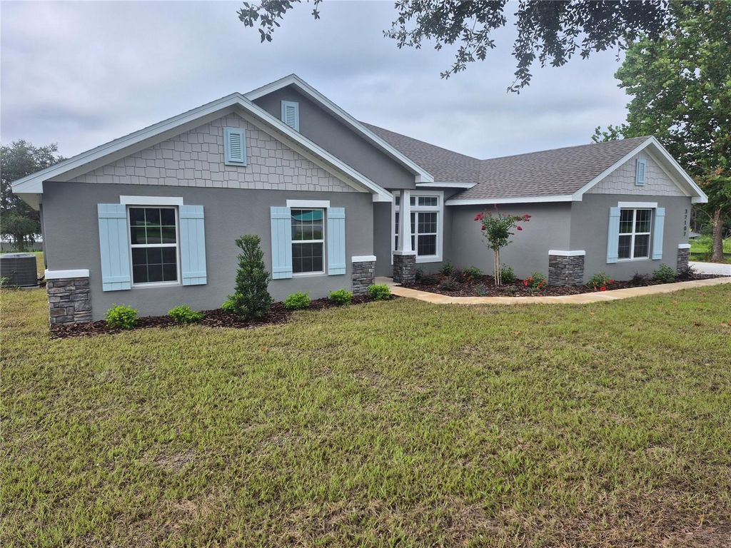 Photo of 37107 Hidden View Cir, Dade City, FL 33523 (MLS # TB8423868)