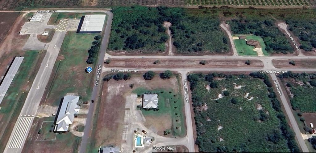 Photo of 1380 Concorde Parkway NW, Lake Placid, FL 33852 (MLS # O6356977)