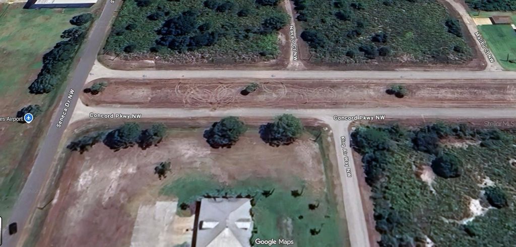 Photo of 1380 Concorde Parkway NW, Lake Placid, FL 33852 (MLS # O6356977)