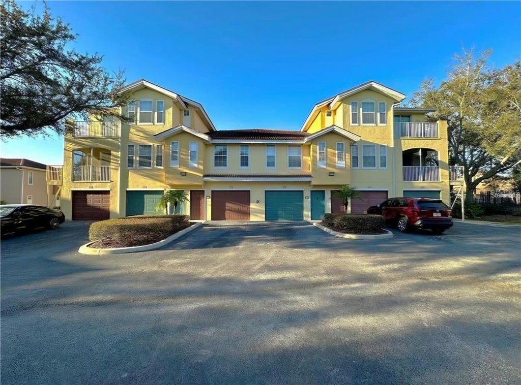 Photo of 12212 Wild Iris Way #104, Orlando, FL 32837 (MLS # OM734888)