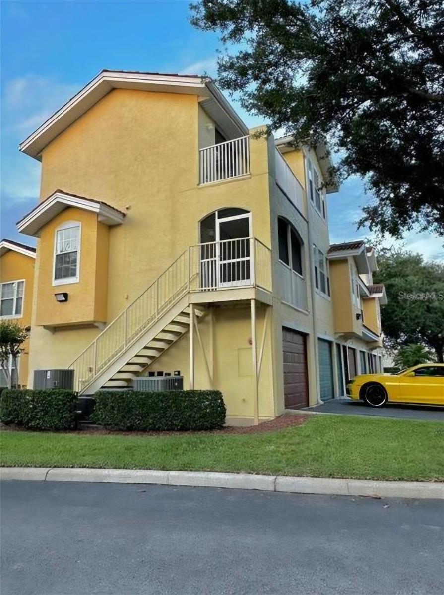 Photo of 12212 Wild Iris Way #104, Orlando, FL 32837 (MLS # OM734888)
