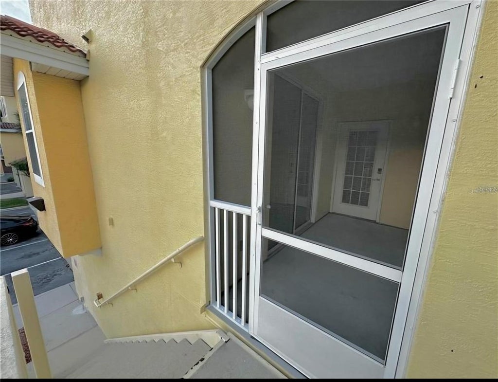 Photo of 12212 Wild Iris Way #104, Orlando, FL 32837 (MLS # OM734888)