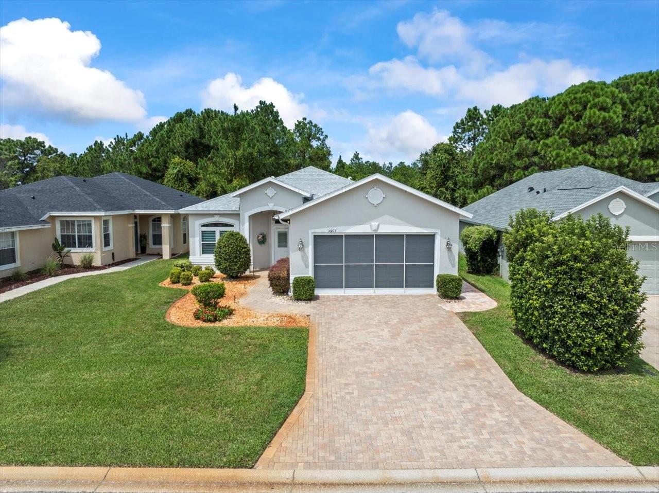 Located in Glen Lakes, this is a completely updated 1999 Addison Windward maintained home with 2 bedrooms+den+Florida Room/2 baths/2 car garage. NEW ROOF IN 2023!, NEW A/C IN 2021! NEW DOUBLE PANE WINDOWS AND NEW ENTRY DOOR. NEW WATER SOFTENER. NEW WATER HEATER. Freshly painted interior and exterior in 2023. New garage door screen and service door, new luxury vinyl flooring throughout, all new electric receptacles and switches, new Norman Perfect Sheer window coverings (verticals and shades). Located on a peaceful Preserve lot, this home has paver brick driveway and walk, Curb-a-Lawn with stone in the landscape beds. The kitchen is fully remodeled with new wood cabinets, new granite counters, new stainless steel appliances, new sink and faucet, sunny breakfast nook, closet pantry. Open concept great room floor plan, high 15 foot vaulted and high flat 10 foot ceilings. The spacious den has built-ins and beautiful molding, pocket doors for entry can easily be converted to a 3rd bedroom. The primary suite has a tray ceiling, walk-in and built-in closets. The bath has separate tub and shower, dual sinks, granite counters. The second bath has granite counters and new faucet. This light and airy home has entry to the L-shaped Florida Room via dining room and living room sliders. The Florida Room is glassed in for year-round comfort with new shade film on windows. All appliances including washer/dryer convey. This home shows pride of ownership and is immaculate and truly move-in ready. HOA FEES INCLUDE CABLE AND HIGH SPEED INTERNET AND PRIVATE MAINTAINED STREETS, 24 HOUR SECURITY WITH MANNED GATE. Maintenance for this home includes exterior water, grass cutting, sprinkler repair, fertilization of lawn, escrow for roof cleaning and escrow for exterior painting. 1778 living sq. ft., 2514 total sq. ft. Glen Lakes is a wonderful gated and manned golf course community and surrounded by the 85,000 acre Chassahowitzka National Wildlife Refuge. The required social membership gives access to the clubhouse, restaurant, bar, Jr. Olympic size heated pool/spa, fitness center, clay tennis courts, pickleball courts and a vast array of social clubs. golf memberships also available.