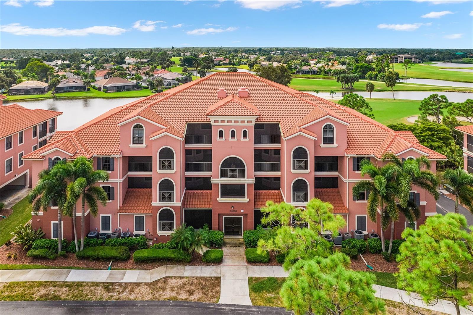 Meet Esplanade - where resort-style living meets everyday comfort and incredible value. This 3rd floor condo offers nearly 1,800sf of beautifully designed living space, complete with stunning golf course, lake, and glorious Florida sunset views. Bright, spacious, and move-in ready, this 2 bedroom + den, 2 bath residence with private garage lives large with an open-concept layout, including 10ft ceilings, split floor plan, and high-end finishes throughout. A well-appointed galley kitchen features 42” cabinets, solid surface counters, newer streak-free stainless appliances, decorative tile backsplash, and upgraded pendant lighting over the breakfast bar that opens to the comfortable living room. A charming breakfast nook at the other end offers a peaceful start to your day with views of the fairway, while the expansive dining area with stunning new chandelier above easily seats eight—perfect for entertaining. Southern exposure bathes the large living room with natural light from wide sliding doors. Step out to the spacious screened porch and relax watching the sights and sounds of Florida wildlife, golfers on the course, several tranquil lakes, and postcard-worthy sunsets! This unit has one of the premier views in Esplanade. The inviting outdoor space is also accessible from the oversized primary suite, which features dual walk-in closets and a well-designed ensuite bath with dual vanities, a soaking tub, and walk-in shower. A private guest suite is located on the opposite side of the unit with an adjacent full bath, while a versatile den can be a third sleeping area, home office, or study. Other desirable upgrades include all-tile flooring throughout, new lighting fixtures, and inside laundry room with added cabinetry. One of the most valuable features is the enormous 2+ car private garage at ground level. Larger than in most homes, it provides exceptional space for vehicles, golf cart, bikes, beach gear, or even a workshop. Whether you're seeking a seasonal retreat or a full-time residence, this beautiful condo offers the ease of low-maintenance with the feel of a single-family home. Some furnishings are also available - ask for details. This is a wonderful community with well-maintained buildings, private heated pool and spa and it’s own gated entry. Don’t miss this opportunity to own one of the best values in the area—come take a look!