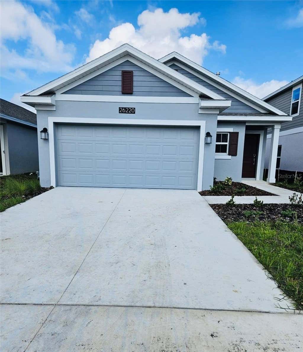 Photo of 26220 Feathergrass Circle, Leesburg, FL 34748 (MLS # O6423365)