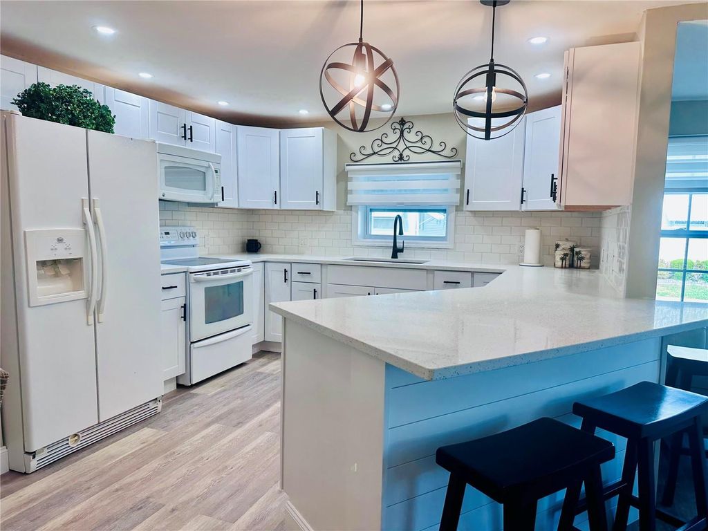 Photo of 1100 Belcher Road S #498, Largo, FL 33771 (MLS # TB8495155)