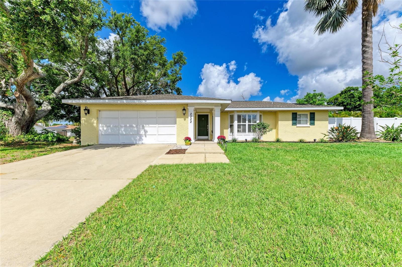 Welcome to your private oasis in sunny West Bradenton, Florida!
This beautifully maintained, split floor plan, 3-bedroom, 2-bath pool home offers the perfect blend of comfort, style, and functionality—ideal for families, entertainers, or anyone looking to enjoy the Florida lifestyle. Situated on a beautifully landscaped, oversized corner lot, this home has a new roof, new garage door, and the pool was just resurfaced with new coping. No HOA, no deed restrictions and not located in a Flood Zone (Flood Zone X/no flood insurance required).
The expansive kitchen is a chefs dream, featuring a large island with stainless steel cabinets, a built-in sink, and seating for 3–4. Enjoy cooking with a double oven, glass cooktop stove, and a brand-new stainless steel refrigerator. A dedicated, well-lit coffee bar area adds a touch of luxury to your mornings, while the adjacent dining space is perfect for hosting. Double French doors open to the lanai, creating a seamless indoor-outdoor flow. The spacious primary suite offers a peaceful retreat with french doors leading to your lanai, ample closet space and a private en-suite bath. Two additional bedrooms are perfect for family, guests, or a home office. The second bathroom is beautifully updated and conveniently located.
Step outside the 3rd set of french doors from the living/family area to your beautiful lanai and newly resurfaced and screened-in pristine pool. Sliding screen doors lead to your private, fully fenced backyard—lushly landscaped with mature trees, palms and fruit trees that provide beauty, shade, and fresh produce. The large yard offers complete privacy and plenty of space for entertaining, gardening, or relaxing. Side gates provide easy access for boat or water toy parking, making this home perfect for outdoor enthusiasts.
The home is located in a quiet and friendly neighborhood. It is ideally & centrally located; just 6 miles from award winning beaches, Downtown Bradenton & River Walk, Palma Sola Bay, boat ramps, Historic Cortez Village, GT Bray Park, and YMCA. Excellent Private Schools, IMG Academy, LECOM Park, other Cultural Attractions & Amenities including Restaurants & Shopping nearby