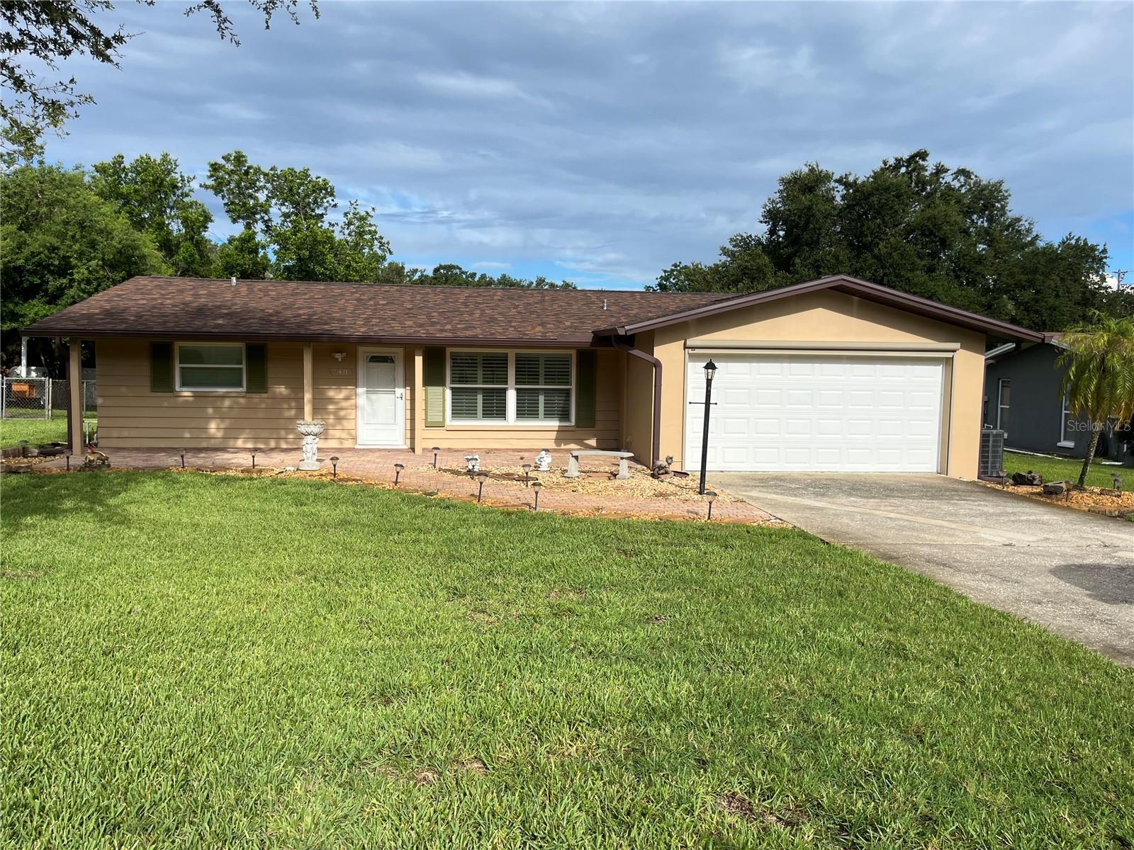 This charming 3-bedroom, 2-bathroom property offers a split floor plan and a 2-car garage, perfect for modern living. Property located outside of the flood zone and outfitted with hurricane impact windows and a new roof. The spacious home features plantation shutters, a bonus room ideal for a home office or playroom, and a master suite with an en-suite bathroom and a walk-in closet. The chef's kitchen is a dream, complete with granite countertops, bar seating for four, stainless steel appliances, custom hardwood cabinets, and a sleek vent hood. The expansive covered front patio and paved rear patio with a large backyard and custom tough shed provide plenty of space for outdoor enjoyment. Electric screen on the garage door, new washer & dryer, and sprinkler system on well for maximum efficiency. Situated on a 1/4-acre lot, this home is conveniently located near public boat ramps and some of America's best beaches. It's just a short walk to the neighborhood park with a playground and fitness center. This golf cart-friendly community features two world-class country clubs, high-end restaurants, and shopping nearby. Tenant pays all utility bills: water, sewer, garbage.
Lawn mower service included in rent.