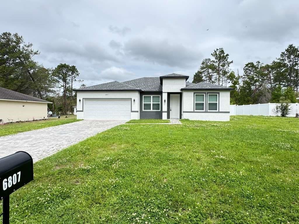Photo of 6807 SW 153rd Place Road, Ocala, FL 34473 (MLS # OM722440)