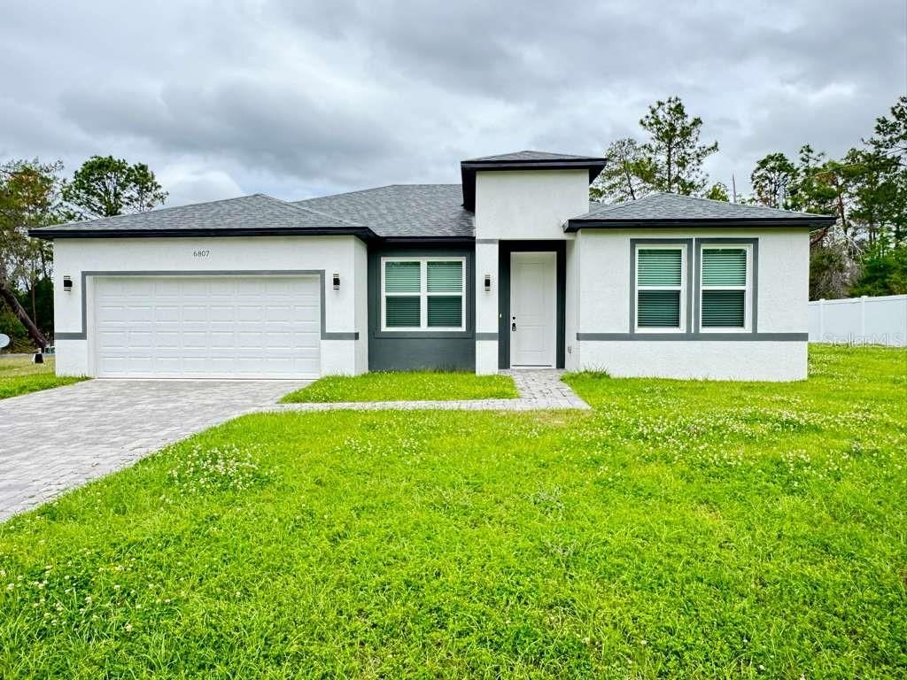 Photo of 6807 SW 153rd Place Road, Ocala, FL 34473 (MLS # OM722440)