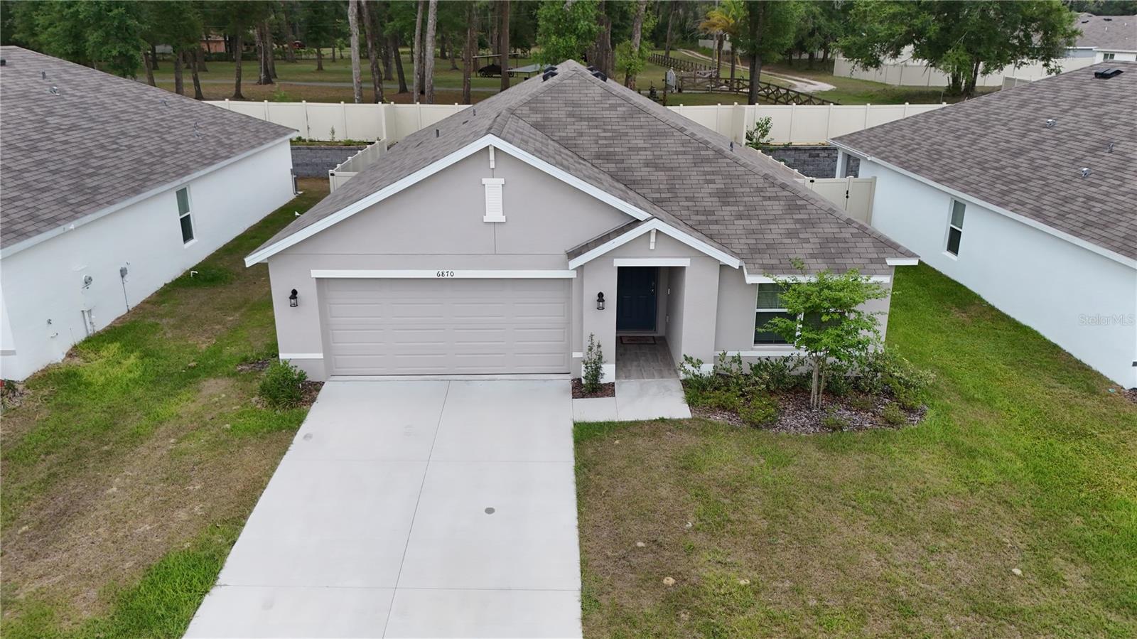 Discover this impeccably maintained 3-bedroom, 2-bathroom single-family residence nestled in the highly desirable Autumn Glen community of Belleview, FL. This inviting home boasts a thoughtfully designed, light-filled open floor plan that seamlessly blends style and function-ideal for both everyday comfort and effortless entertaining.
The heart of the home is the well-appointed kitchen, complete with modern appliances, ample cabinetry, and generous counter space-perfect for cooking enthusiasts and busy households alike. Adjacent to the kitchen, the expansive living and dining areas provide plenty of room to relax, gather, and make lasting memories. For added convenience, the home features an in-unit washer and dryer, making laundry days a breeze.
Retreat to the spacious primary suite, offering comfort and privacy, while two additional bedrooms provide flexibility for family, guests, or a dedicated home office.
Step outside to a private outdoor oasis featuring a covered lanai, a fully fenced yard, and a professionally pavered backyard-ideal for morning coffee, weekend barbecues, or quiet evenings under the stars.
Situated just minutes from top-rated local schools, scenic parks, and a variety of shopping and dining options, this home combines serene suburban living with unbeatable convenience.
Don't miss the opportunity to make this move-in-ready gem your own-schedule your private showing today!