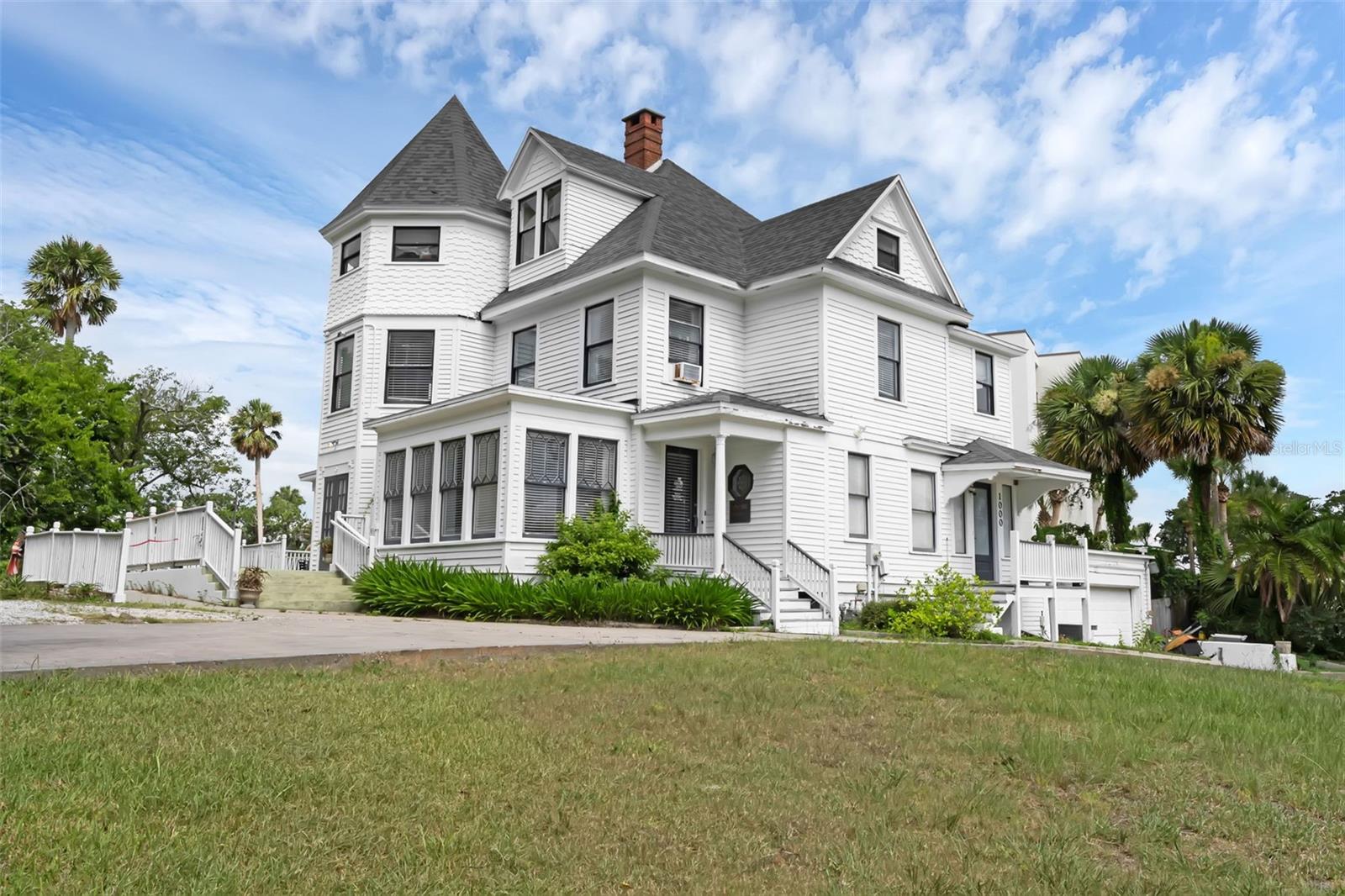 Historic Victorian Gem with Intracoastal Views | Endless Potential on 1.25 Acres Step into timeless elegance with this iconic three-story Victorian home, famously known as the Hotchkiss Estate a true Daytona Beach landmark with rich history and unmatched character. Originally built by the inventor of the stapler, this home stands as a tribute to craftsmanship, innovation, and old-world charm. Nestled on a 120 x 554 ft lot (approx. 1.25 acres) with breathtaking direct deep water Intracoastal Waterway views, this rare estate offers endless potential for both residential and commercial use. Whether you're dreaming of a grand private residence, a charming bed & breakfast, event venue, or boutique restaurant, this property is ready for its next chapter. Key Features: 5 guest suites (2 with private baths) ideal for guests or hospitality use Expansive master retreat with private living area and outdoor veranda overlooking the water
Fully equipped commercial kitchen - a chef's dream for events or business ventures
Grand formal dining room + butler's pantry - perfect for entertaining
Multiple covered porches, balconies & a sun-filled 10x32 sunroom for enjoying the serene setting
Spacious living areas, including a cozy fireplace and inviting family room
Newer roof in place - interior in need of renovation, offering a customizable opportunity
Location Highlights:
Prime waterfront parcel in the heart of Daytona Beach
Minutes to beaches, shops, dining, and entertainment
Zoned for a variety of uses - residential or commercial possibilities
Whether you restore it to its former glory or reimagine it with your own vision, this property is a once-in-a-lifetime opportunity to own a piece of Daytona's past and shape its future.
Schedule your private tour today and experience the magic of the Hotchkiss Property!
_______________________________________________