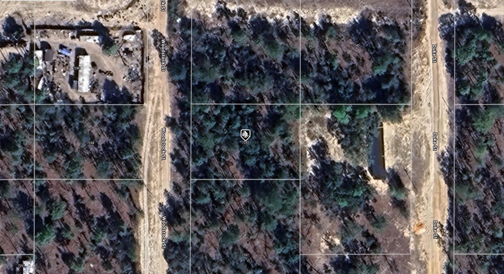 Photo of 7243 Woodstock Street, Keystone Heights, FL 32656 (MLS # A4705010)