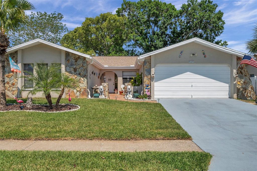Photo of 7607 Cypress Knee Drive, Hudson, FL 34667 (MLS # TB8429437)