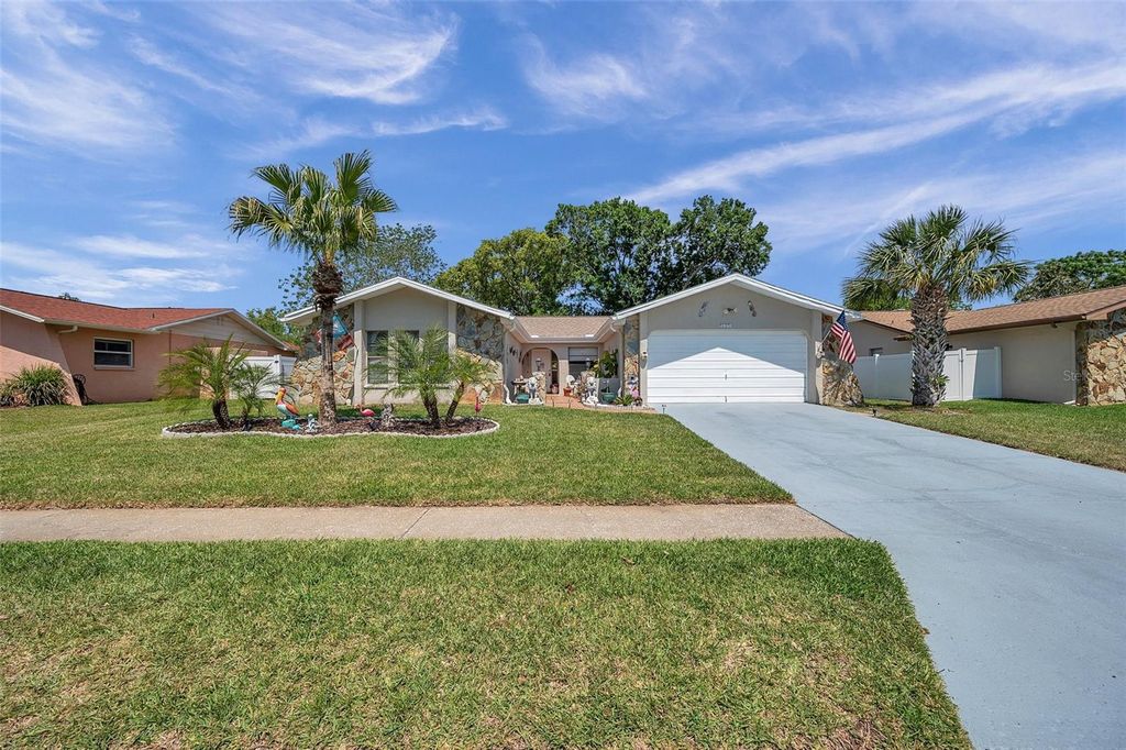 Photo of 7607 Cypress Knee Drive, Hudson, FL 34667 (MLS # TB8429437)