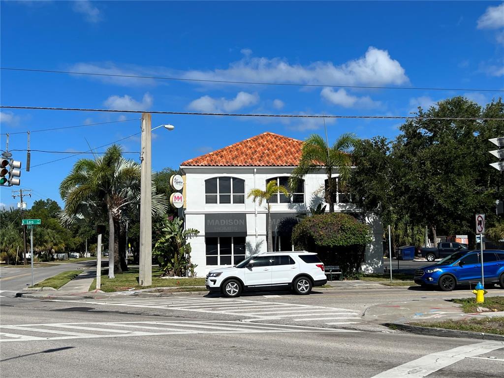 This beautiful freestanding South Tampa retail office building is located at the lighted intersection of Lois Ave and Henderson Blvd and is a high end, high visibility building with a concrete barrel tile roof and lush tropical landscaping. The 2 story structure has elevator access and consists of 2 suites totaling 5,464 SF. The ground floor space (2,732 SF) is a beautiful retail office suite. There is a wide open and inviting reception area and open workspace and a circular conference room with floor to ceiling glass walls that connects to a large fully equipped kitchen/break room offering convenient food and beverage service for visiting clients. There are 6 private offices, 2 restrooms, and a data closet. The 2nd floor space (2,732 SF) is currently built out as office. The space has a small reception area with adjacent circular glass walled 8 person conference room. There are 2 restrooms, a break room, 6 private executive-size offices, large open managerial office with 2 work stations, as well as a large bullpen area with 4 (8ft x 8ft) , half-wall cubicle spaces, and a large drafting/file storage table, as well as additional A/C storage space in the finished attic with staircase access. The site has ample parking in an area traditionally starved for adequate parking. The entire building could be made available within a reasonable timeframe, although the ground floor tenant has expressed interest in extending if purchaser is an investor or user who might only need to occupy the 2nd floor. Located in South Tampa on Lois Avenue at the corner of Henderson Boulevard.
Sale: $2,490,000
Also available for lease:
Suite 100 - 2,732 SF - $27.00 sf/yr NNN + CAM: $7.13 - Initial estimated monthly rent: $8,039 (base rate + CAM + sales tax)
Suite 200 - 2,732 SF - $24.00 sf/yr NNN + CAM: $7.13 - Initial estimated monthly rent: $7,308 (base rate + CAM + sales tax)