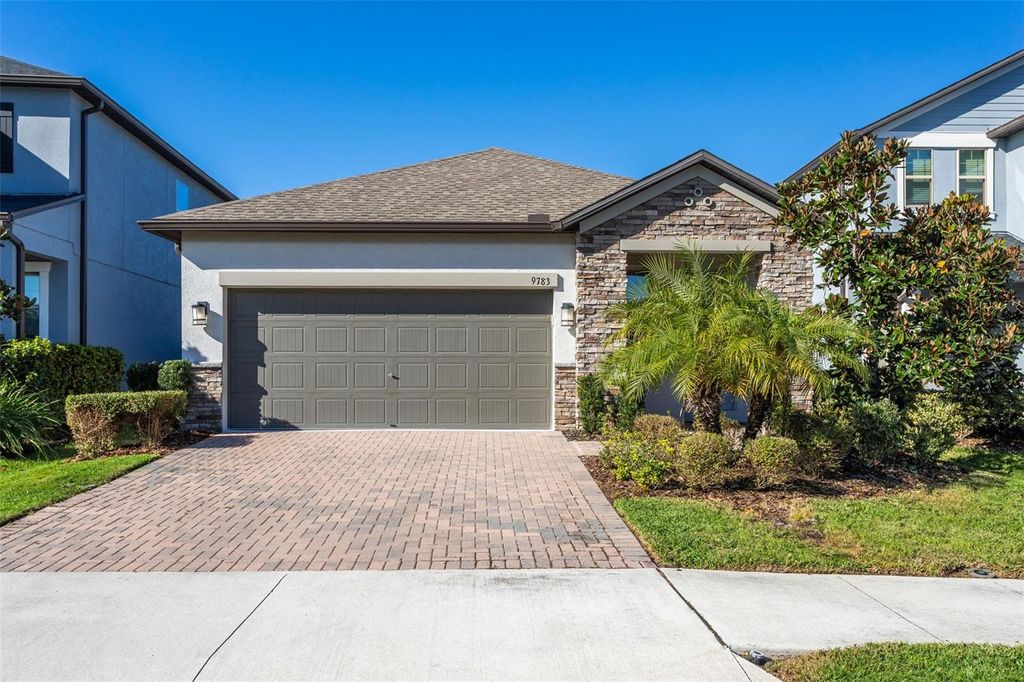 Photo of 9783 Wild Begonia Loop, Land O Lakes, FL 34637 (MLS # TB8459059)