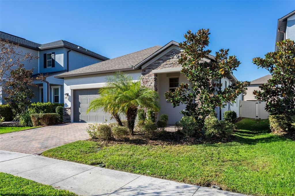 Photo of 9783 Wild Begonia Loop, Land O Lakes, FL 34637 (MLS # TB8459059)