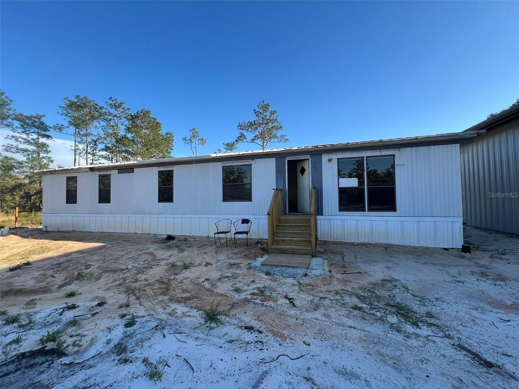 Photo of 8342 SW 152nd Place, Dunnellon, FL 34432 (MLS # O6393101)