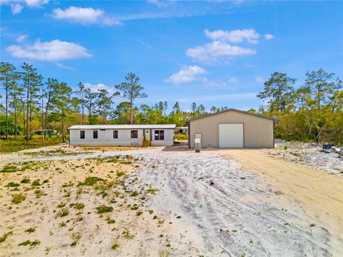Photo of 8342 SW 152nd Place, Dunnellon, FL 34432 (MLS # O6393101)