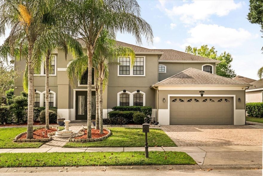 (Seller Financing Available) Welcome to this stunning 6-bedroom, 4.5-bath home in the heart of Lake Mary. Designed for comfort and style, this residence features two full kitchens with upgraded stainless steel appliances and sleek California-style countertops—perfect for entertaining or multigenerational living.

The first floor is finished with elegant tile throughout and includes a private in-law suite. High ceilings at the entrance and an open floor plan create an airy, inviting feel. Enjoy mornings in the Florida room filled with natural light, or step outside to your own backyard oasis.

The paved and screened outdoor area offers a sparkling pool with spa, a spacious 2,500 sq. ft. backyard with a charming gazebo, and plenty of room for family gatherings. Additional highlights include a two-car garage, an electric vehicle charging station, and a peaceful neighborhood setting near a golf area at the back of the community.

This home truly blends custom features with everyday convenience—an ideal choice for those seeking space, functionality, and a prime Lake Mary location.