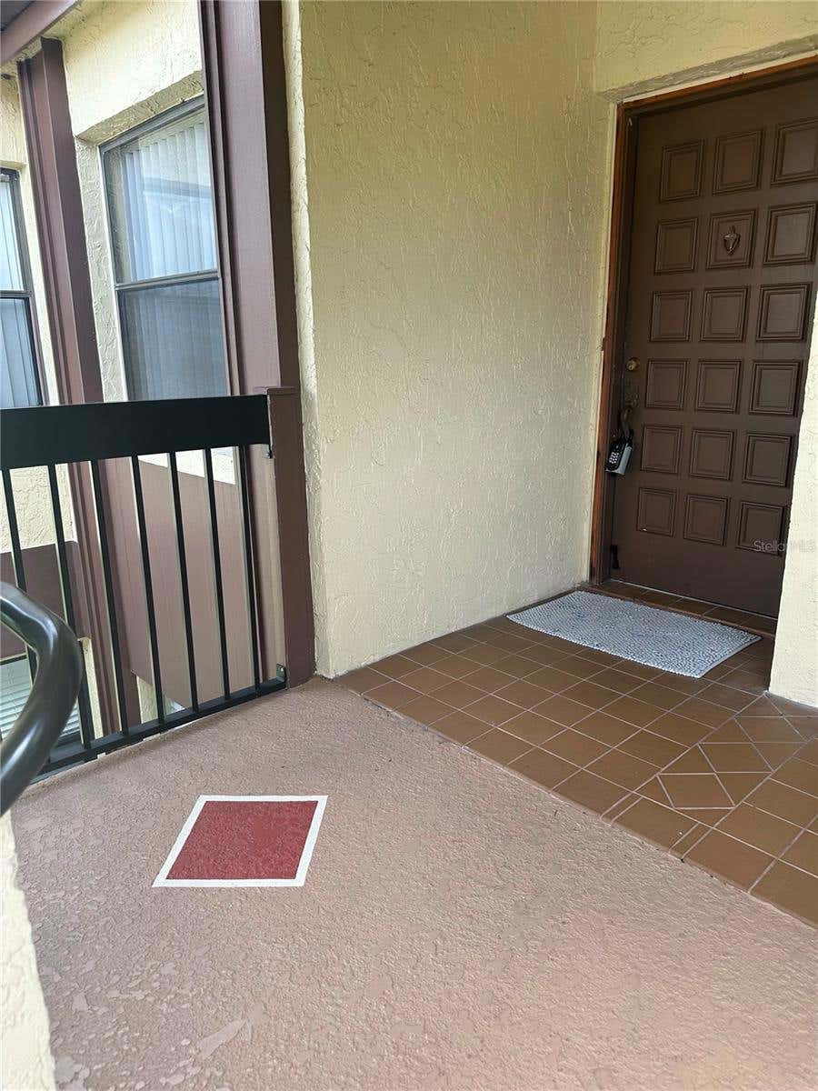 Photo of 3245 Candle Ridge Drive #203, Orlando, FL 32822 (MLS # O6431225)