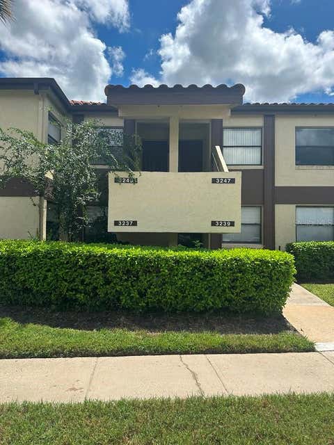 Photo of 3245 Candle Ridge Drive #203, Orlando, FL 32822 (MLS # O6431225)