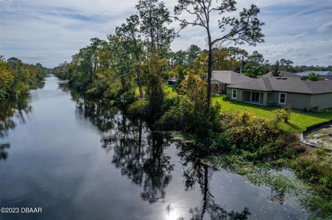 Photo of 75 Perthshire Lane, Palm Coast, FL 32164 (MLS # O6358951)