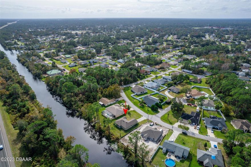 One or more photo(s) has been virtually staged. NOT IN A FLOOD ZONE! NEVER FLOODED! Built in 2020, this solid concrete block home offers 3 bedrooms plus a private office (optional 4th bedroom), 2 bathrooms, and over 1,600 sq ft of living space (2,279 total). Enjoy peace of mind with a 2020 roof, 2020 A/C, 2020 water heater, and a brand-new Samsung front-loading washer and dryer. This home includes energy-efficient stainless steel appliances and stunning granite countertops throughout with a breakfast bar, complementing the spacious and open split floor plan. The primary suite features a walk-in closet and private en-suite bath, while the opposite wing offers two guest bedrooms and a full bath. A covered lanai provides a relaxing outdoor space overlooking lush landscaping and tranquil freshwater canal views—ideal for fishing, kayaking, or canoeing from your backyard. Situated on a .23-acre lot, this home is conveniently located near parks, conservation areas, beaches, shopping, restaurants, and more.

A wonderful opportunity to enjoy modern comfort, peaceful surroundings, and Florida living at its bestcome see this beautiful home today! All information deemed reliable but not guaranteed;