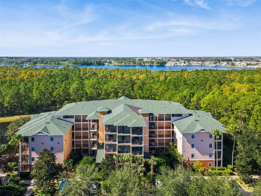 Here’s your chance to own this beautiful FULLY FURNISHED short-term rental approved, first-floor two-bedroom, two-bath end unit condo in the highly sought-after 24/7 Guard Gated resort community of Caribe Cove! This spacious unit offers stunning conservation and pond views. The large kitchen is perfect for the family chef, featuring new stainless steel appliances, 42” solid wood cabinets, a breakfast bar, and an open layout overlooking the family room. There is also a dining room for large gatherings. The primary suite includes a walk-in closet, luxurious garden tub, separate shower, dual vanities, and private access to a screened patio—perfect for relaxing and enjoying the peaceful natural surroundings. The second bedroom features its own walk-in closet and direct bathroom access, providing comfort and privacy for guests. Inside laundry room included for convenience. Step out onto the large screened patio off the family room and enjoy tranquil pond and conservation views—ideal for morning coffee or evening sunsets. Recent updates include: new stainless steel appliances, fresh interior paint, and new carpet. The Caribe Cove Resort community offers exceptional amenities including a resort-style pool, hot tub, sauna, and fitness center. Conveniently located just minutes from Orlando’s world-famous theme parks, shopping, and dining. Whether you’re looking for a vacation home, investment property, or full-time residence, this is Florida living at its best!