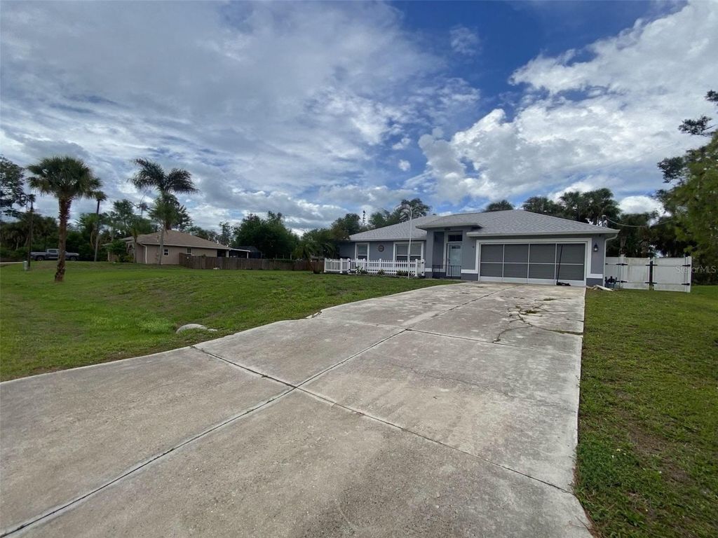 Photo of 1929 Norvell Avenue, North Port, FL 34286 (MLS # A4690456)