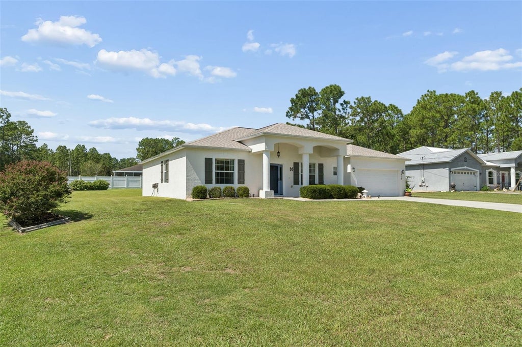 Photo of 7810 N Cricket Drive, Citrus Springs, FL 34434 (MLS # OM732588)