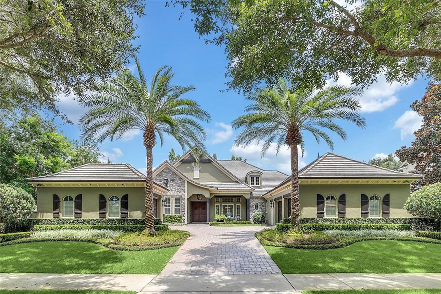 Windsong hard-to-find one-story estate home on newly landscaped lot. Home has been completely updated with new appliances, built-ins, and updated baths and kitchen. Large primary bedroom suite with huge closet and updated bathroom. All bedrooms are en suite and a split plan as well. The family room has a gas fireplace and views of the pool. Large rear porch with retractable screens and summer kitchen overlooking the beautiful pool/spa and private backyard oasis. The three-car garage is airconditioned and could be used as a workout room. This home is meticulously maintained and has so much to offer. All of this in the Windsong community which provides access to WP Chain of Lakes, 2 community pools, and several parks.