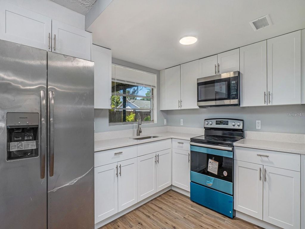 Photo of 1405 Castleworks Lane, Tarpon Springs, FL 34689 (MLS # TB8467102)