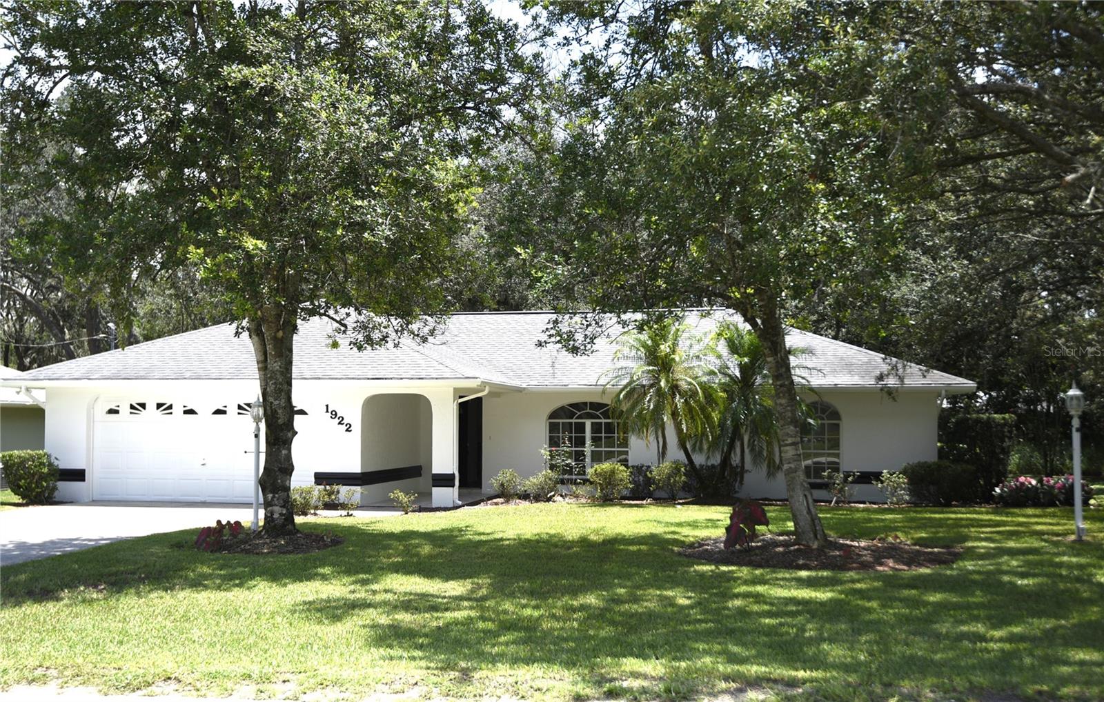 Great opportunity for a gorgeous home in a quiet neighborhood in Avon Park. This property is on a quiet corner, with no neighbors behind or on the left side. It is a large wooded lot that is nicely landscaped. Upon entering the home you are greeted with a tile front entrance. The inside boasts of a open floor plan with brand new luxury vinyl plank flooring throughout the entire home. Beautiful wood butcher block countertops grace the kitchen. The home inside and out has been newly painted along with the installation of brand new ceiling fans. All the sinks and faucets, door knobs and hinges are also new. In the garage there is an emergency switch generator, an irrigation system, and an garage door opener. You don't want to miss out on this spectacular home with all the upgrades.