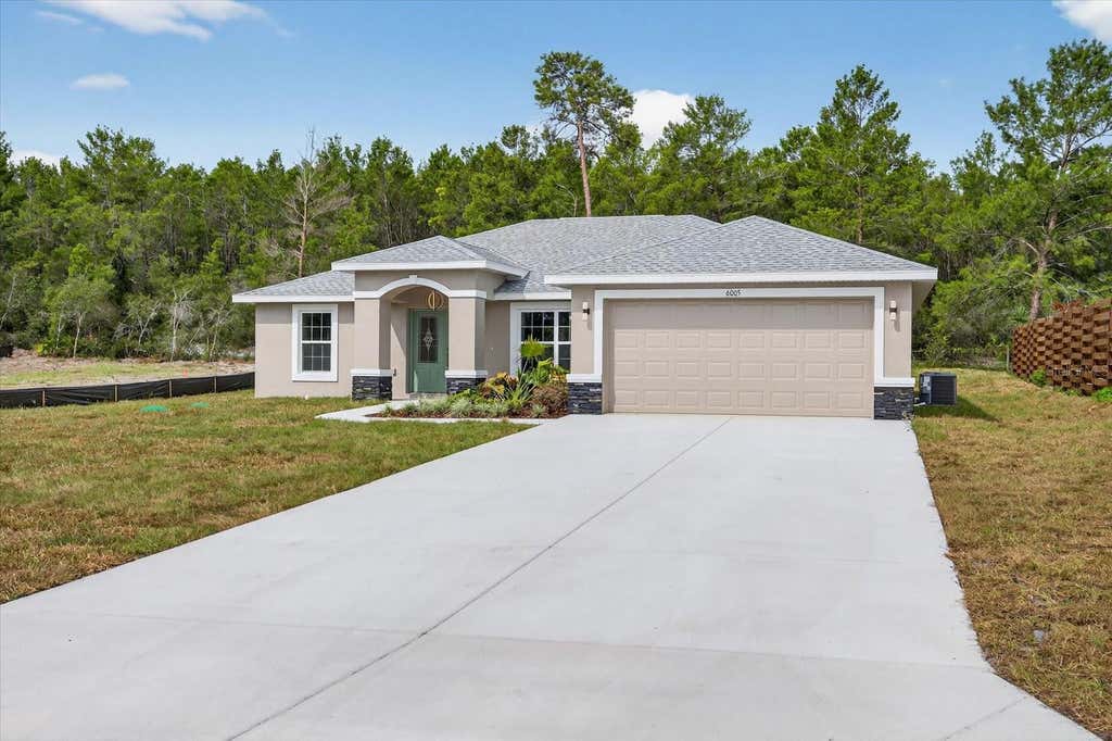 Photo of 6005 Moongate Road, Spring Hill, FL 34606 (MLS # TB8512332)