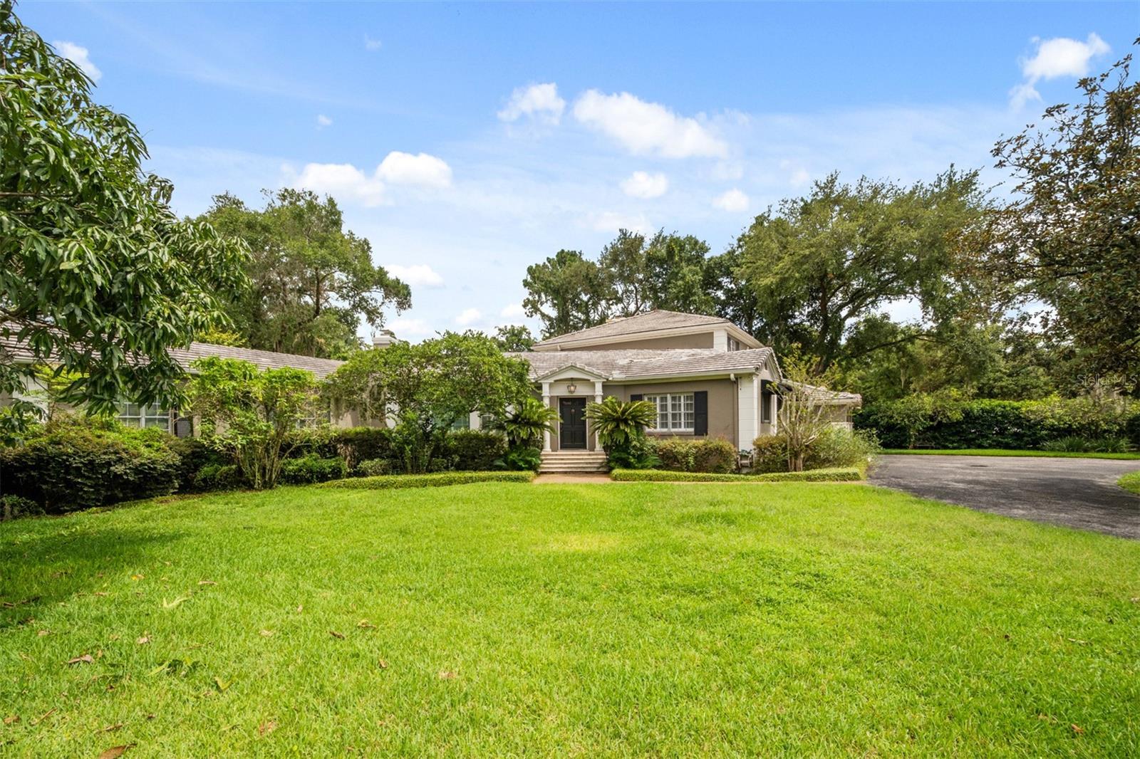 Quintessential Winter Park Stunner. This well appointed home is situated on a half acre corner lot just two blocks away from Winter Park's shopping and dining district, Park Avenue. Surrounded by majestic oak trees you find this classic 4 bedroom, 4 bath home with 3600sq ft of living space. An abundance of natural light welcomes you in the homes central hub, the Family Room. Anchored by one of the homes 3 fireplaces, the family room features soaring floor to ceiling windows, showcasing the outdoor living space which includes a pool, hot tub and plenty of green space to enjoy the Florida sunshine. French doors opening to the homes downstairs master retreat, complete with its own private courtyard, his and her closets, walk-in shower and the large jetted tub offers a quiet retreat at the end of your day. With both indoor and outdoor entertaining areas, this home is perfect for all your summer gatherings. Lawncare, pest control and pool maintenance included. Professionally managed. Call today for your private showing.