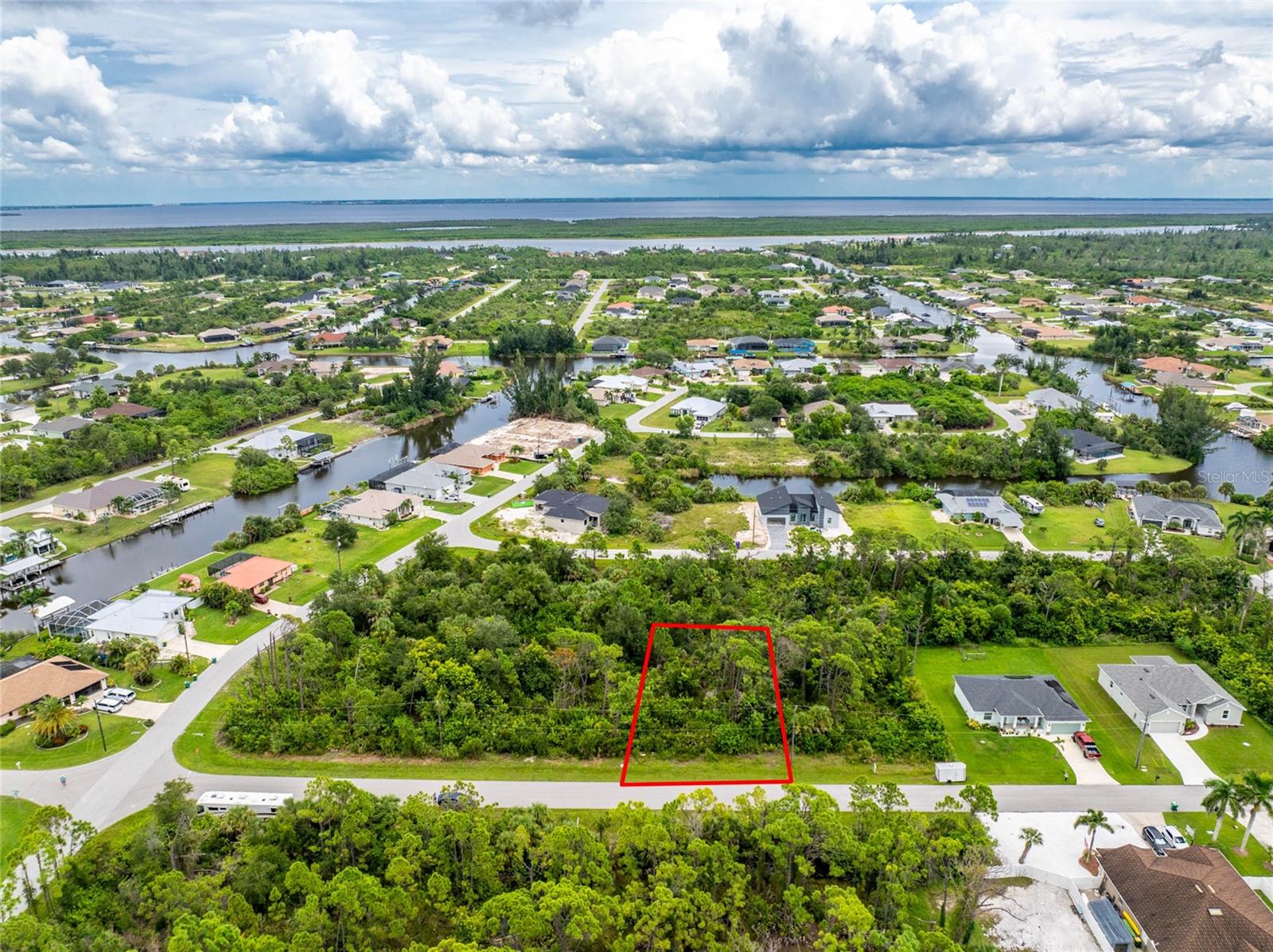 Welcome to South Gulf Cove, a deed-restricted waterfront community where coastal living meets everyday convenience. This vacant homesite is the perfect canvas for your new build, offering public water and sewer access with electricity nearby.
Residents of South Gulf Cove enjoy more than just a neighborhood — they enjoy a lifestyle. With an optional HOA of just $120/ year, the community provides neighborhood parks, walking paths, and a public boat ramp. From there, boaters can explore over 55 miles of canals that lead to Charlotte Harbor and out to the Gulf of Mexico.
The location is just as impressive: close to top-rated schools, championship golf courses, marinas, shopping, dining, and some of Florida’s most pristine beaches, including Boca Grande and Englewood. Whether your vision is a winter retreat, full-time residence, or future investment, this lot places you in the heart of Southwest Florida’s coastal playground.