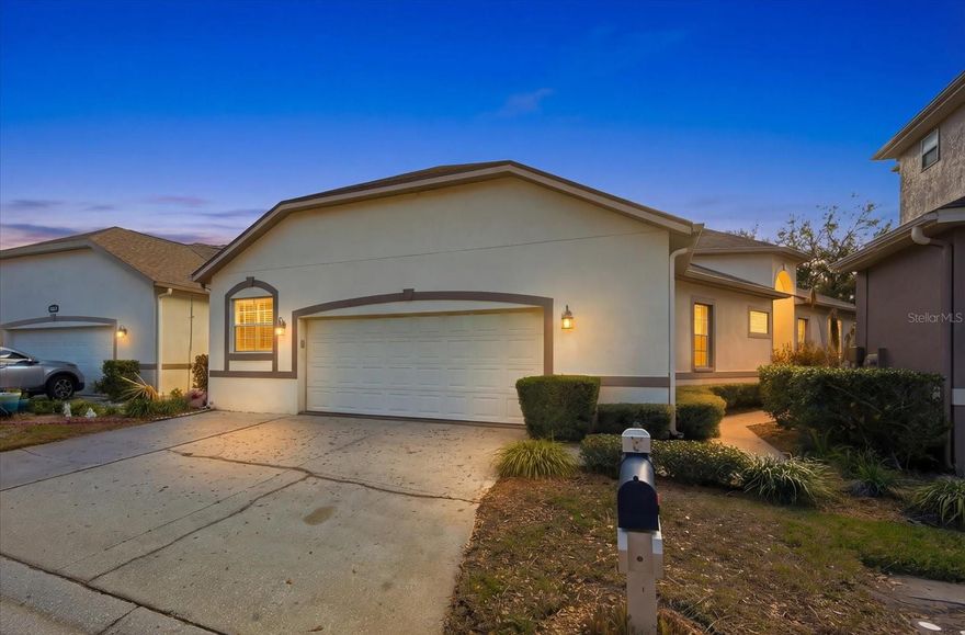 Step into the private, country-club lifestyle you’ve been craving, without the upkeep, at 5202 Fairway One Dr in Valrico, located in the 24/7 guard-gated River Hills Golf and Country Club community. From the moment you arrive, you’ll feel it: live-manned security at the gate, beautifully maintained tree-lined streets, and a peaceful, upscale setting that feels like a retreat while staying close to everything Brandon and Tampa have to offer. 5202 Fairway One Dr is a beautifully updated single-family home featuring 2 bedrooms, 2 bathrooms, and a den—an ideal fit for buyers looking for comfortable, low-maintenance living with flexible space. Built in 2000 and offering over 2,000 interior square feet, the home welcomes you with high ceilings and hardwood floors that create an open, yet comfortable feel. Crown molding throughout adds a refined finish, complemented by plantation shutters, a glass front entry door, and a freshly painted interior. The kitchen features 42-inch wood cabinetry with glass-front uppers, crown molding, and upper and lower cabinet lighting. You’ll also appreciate the laundry room with built-in cabinetry and a custom walk-in pantry. The eat-in kitchen opens through French doors to a side courtyard and side yard. The impressive great room with soaring ceilings opens through French doors to an air-conditioned Florida room with tranquil views of mature trees and the driving range, bringing the outdoors in while keeping the space comfortable year-round. The primary suite is a true retreat with a charming window seat, a custom built walk-in closet, and an en suite bath offering a double vanity, walk-in glass shower with bench, water closet, linen closet, and additional storage. On the opposite side of the house, the second bedroom is generously sized with its own sitting area and a custom walk-in closet, and the second full bathroom. The two-car garage includes a utility sink, cabinets, built-in shelving, a painted garage floor, plus two separate storage areas—one of which is an additional air-conditioned office/storage room! Beyond the home, River Hills delivers the private club environment buyers search for. River Hills is gated and manned with security guards on site 24/7. The River Hills HOA includes a social membership to the private country club, including access to the clubhouse, newly remodeled fitness center, and junior olympic size swimming pool. River Hills also offers community parks, basketball courts, a playground, walking paths throughout the neighborhood, and a vibrant calendar of events at the clubhouse. Fairway One residents enjoy added convenience with landscaping maintenance included and access to an additional private Fairway One resident-only neighborhood pool. Location is another major advantage. Just outside River Hills’ front gate, River Hills Plaza adds everyday convenience and popular local favorites, including The Landing, The Brunchery, La Villa Mexican, fitness options, and more. You’re also close to top-rated schools and positioned for an easy commute to Tampa, MacDill AFB, Orlando, and Florida’s Gulf beaches. Major updates add peace of mind: the roof was replaced in 2016, the HVAC in 2017, the water heater in 2020, and the range and refrigerator were replaced in the last couple of years. All ceiling fans are new. Schedule your private showing today and come experience why River Hills is one of Valrico’s most sought-after communities. You'll be glad you did!