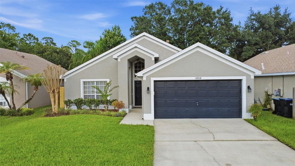 Photo of 10718 Cherry Oak Circle, Orlando, FL 32817 (MLS # O6426296)