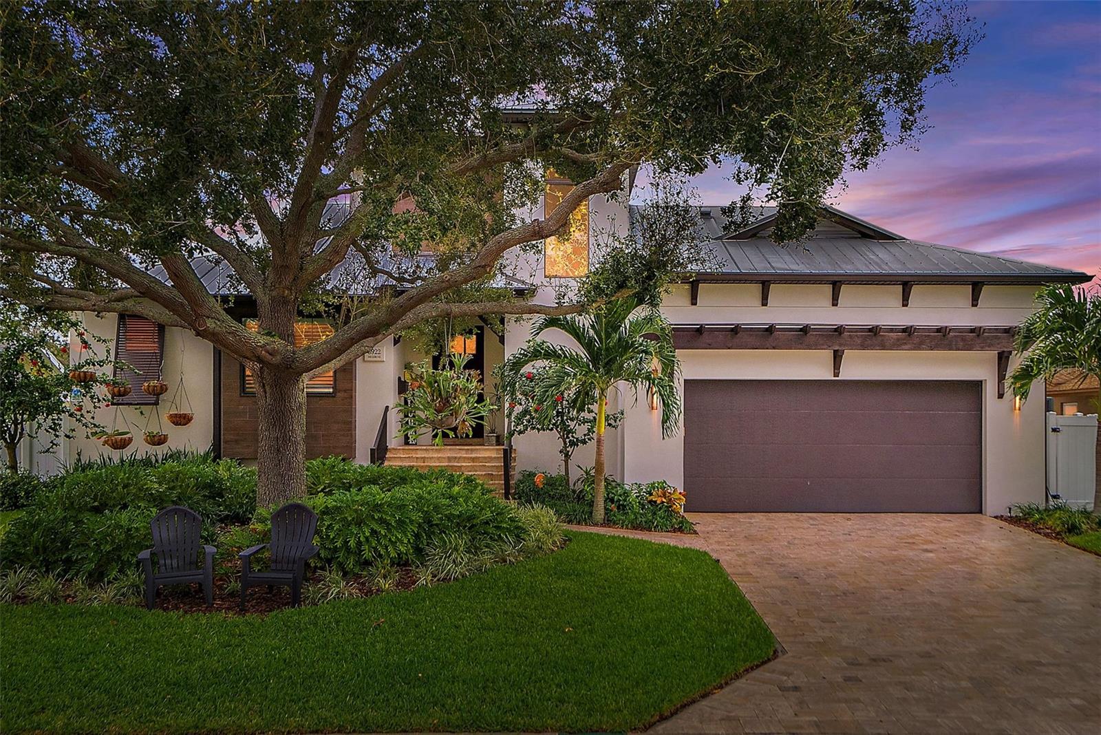 Available for the first time offering you the chance at owning the pinnacle of luxury waterfront living. Located in the desirable neighborhood of Patrician Point, which is mere miles to Downtown St Petersburg. Soaring 10ft ceilings combined with breathtaking water views from the moment you enter this 2017 custom built Frontier Home will immediately put this home at the top of your list! This home was methodically designed to highlight the incredible water view from nearly every room in the home. Generous living space flows seamlessly from one room to the next. Highly desirable one level living everything including the primary bedroom is on the first floor. Second floor features 2 generous bedrooms with a jack and jill bathroom and built in study/homework area. Chef's dream kitchen with all the bells and whistles including 5 burner gas range, double oven, pellet ice-maker, custom cabinets offering storage galore plus a walk-in pantry. High end backsplash and tiling throughout the home as well as custom woodwork throughout. Tray ceilings, decorative beams, and strategically placed wainscoting really set the tone for this luxurious custom built home. Located conveniently off of the kitchen is a showstopping powder bathroom that also doubles as a pool bath. Fully equipped laundry room with extra sink, folding, and hanging space. Living room with remote controlled blinds and sliding doors that open up to the incredible outdoor living space. Primary bedroom with expansive en-suite bathroom with soaking tub, separate shower stall, water closet, and walk-in closet. You will never want to leave home after experiencing this waterfront dream come true outdoor space. Incredible views make for perfect dolphin watching while you dine or entertain. Built-in Twin Eagles gas grill, powered shades, and stained tongue in groove wood ceilings coupled with misting fans to make this a place you will enjoy year round. Sparkling heated saltwater pool with swim shelf, bench, fountains and LED pool lighting. New seawall, new dock with polymer wood, new 10k pound lift. Oversized 2 car garage with 10' door makes parking a larger SUV a breeze. Travertine driveway, walkways, and front patio. Easy access to the fully functional standing attic space with icynene insulation and walking planks making storage a breeze. This home will not last long. Please call today to schedule a private showing. Located minutes (by land or sea) from downtown St. Petersburg’s shopping, dining, Yacht Club and museums.