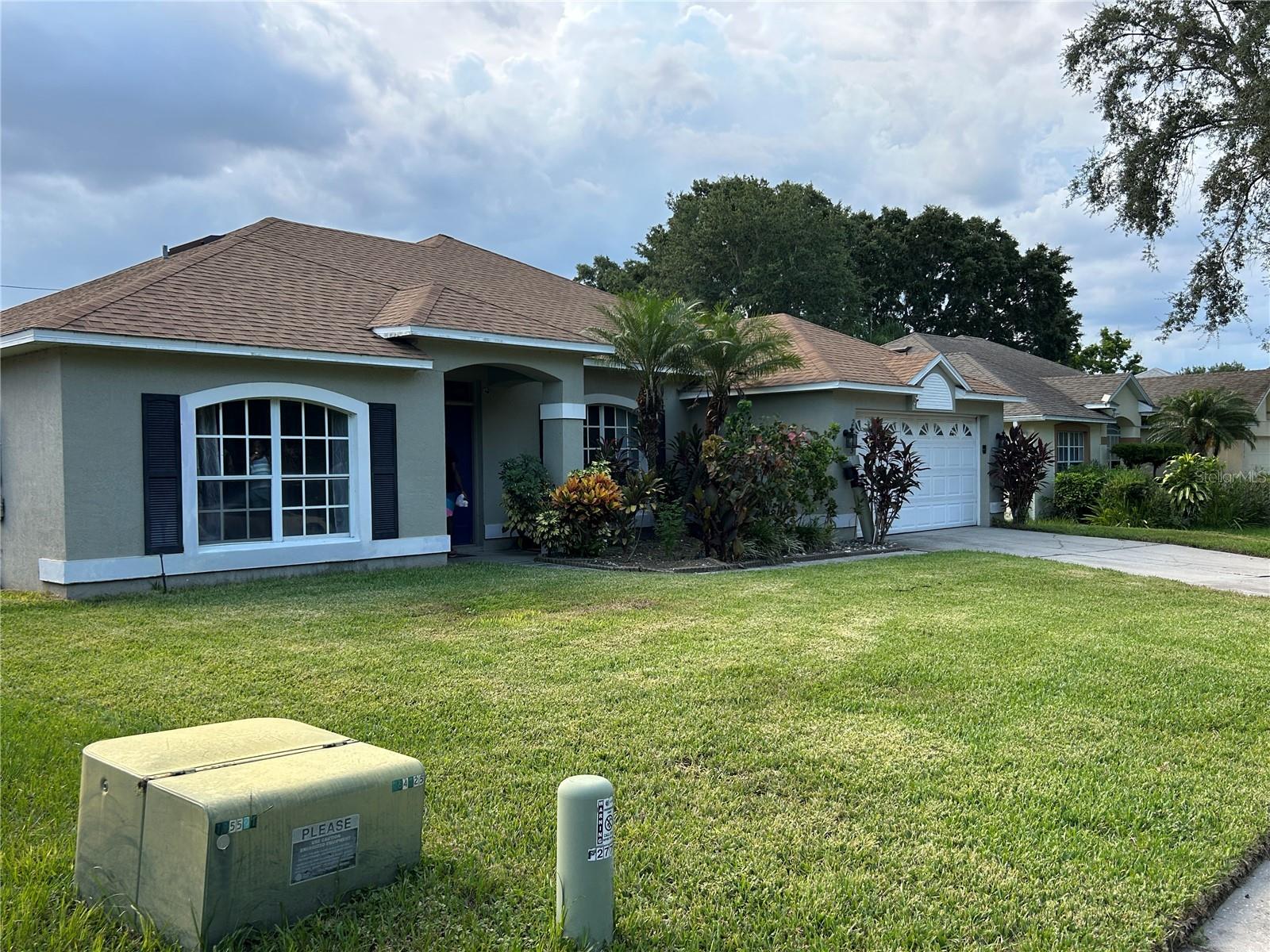 Welcome to this beautiful 3-bedroom, 2-bathroom pool home in the desirable city of Ocoee, this stunning property boasts a specious den, perfect for a home office or a bedroom. Each bedroom offers ample space for comfort and relaxation. The living area offers an open floor plan with a spacious great room and kitchen, and sliding glass doors that lead out to a covered lanai and screened-in swimming pool The pool pump was recently replaced. The backyard is perfect for BBQs and gatherings. Located just minutes from schools, parks, shopping, and major highways, this home offers the lifestyle you've been searching for. Don't miss your chance to make this home yours-Schedule your private tour today! Note: The water softener is excluded in the sale